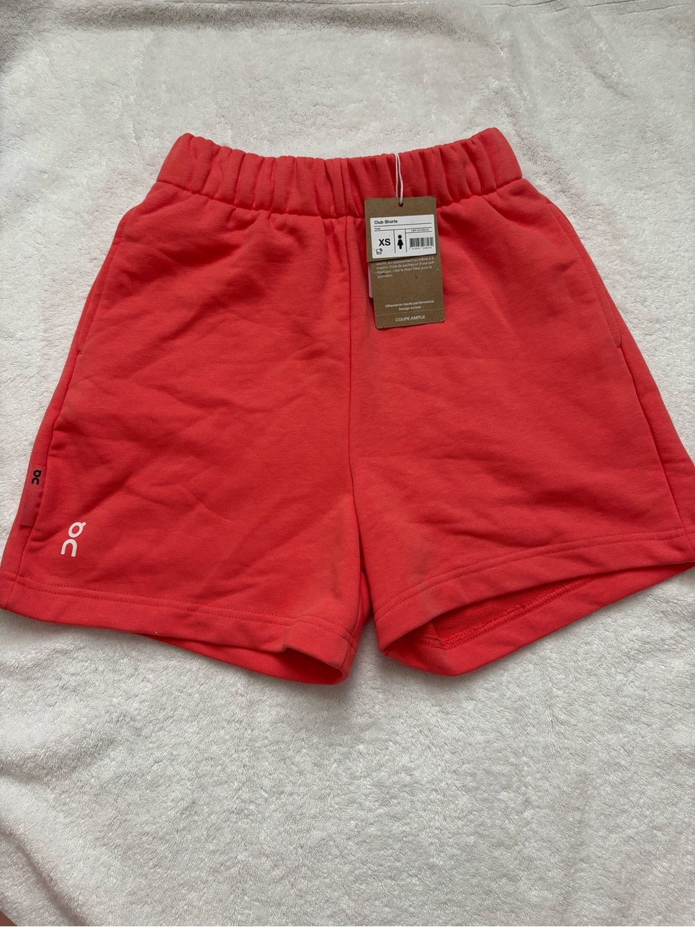 On Running Women’s Coral Red Athletic Shorts - Picture 1 of 3